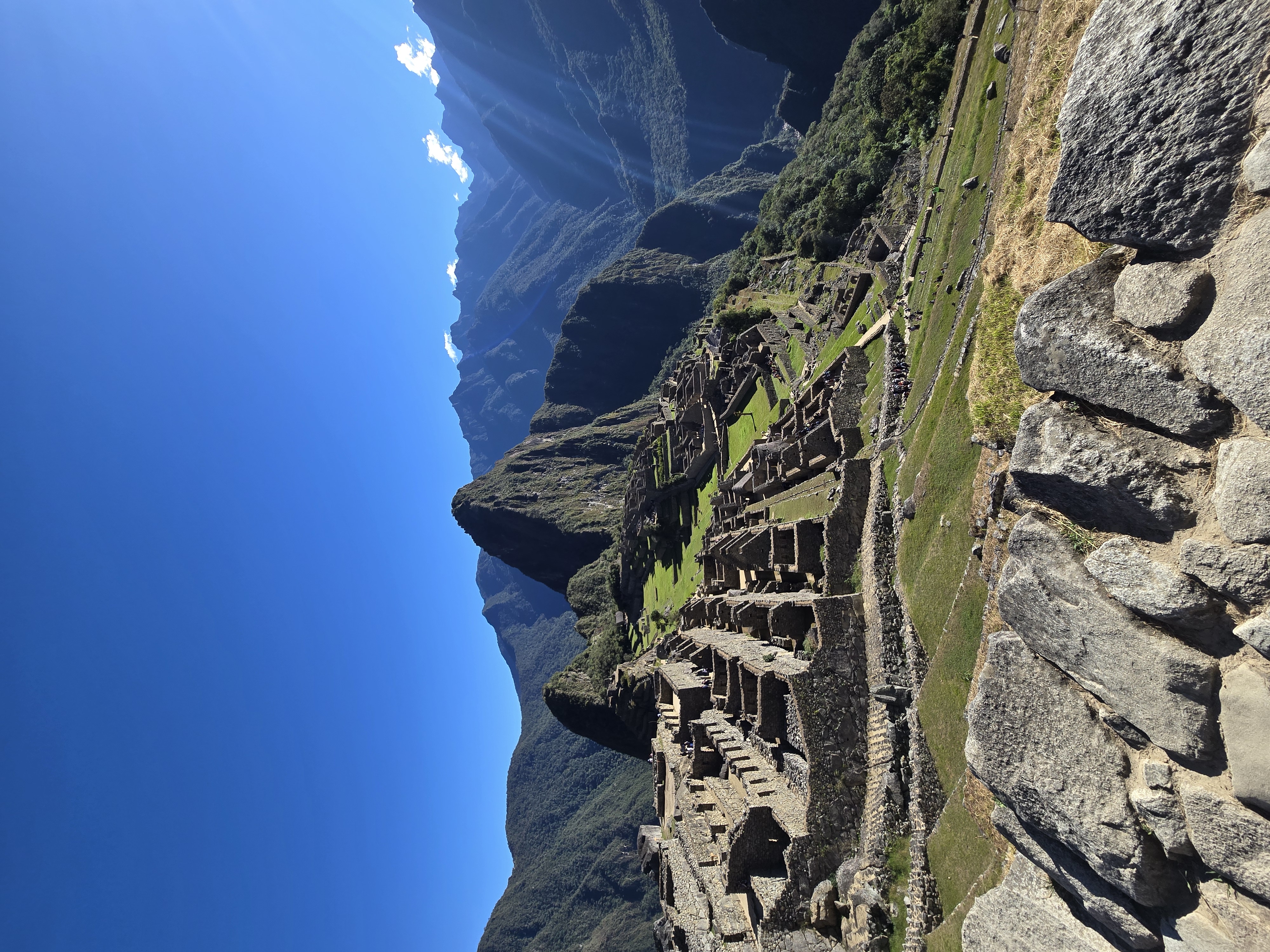 A wide view of Machu Picchu and the surrounding mountains