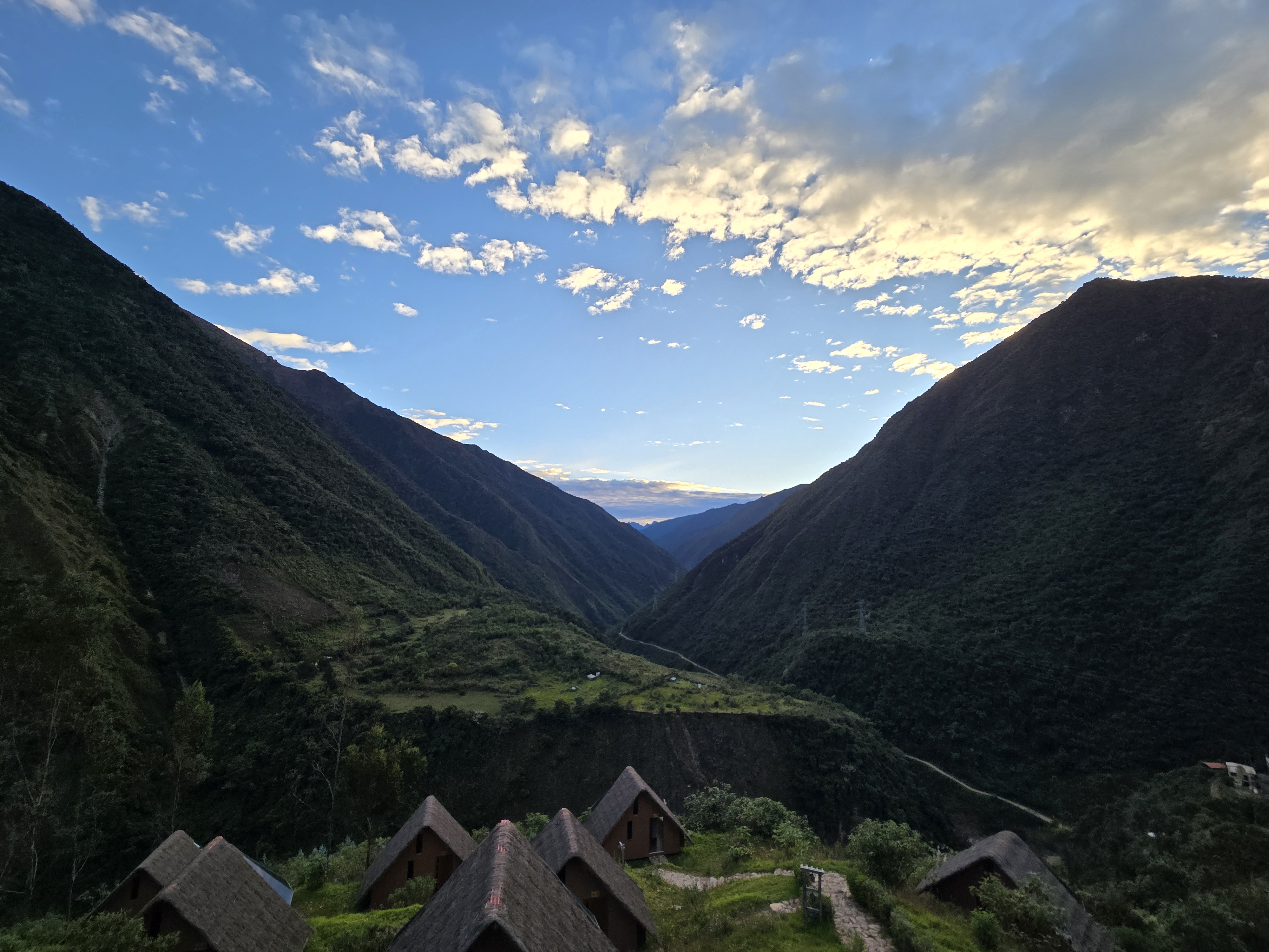 Mountain peaks and dramatic clouds along the Salkantay route