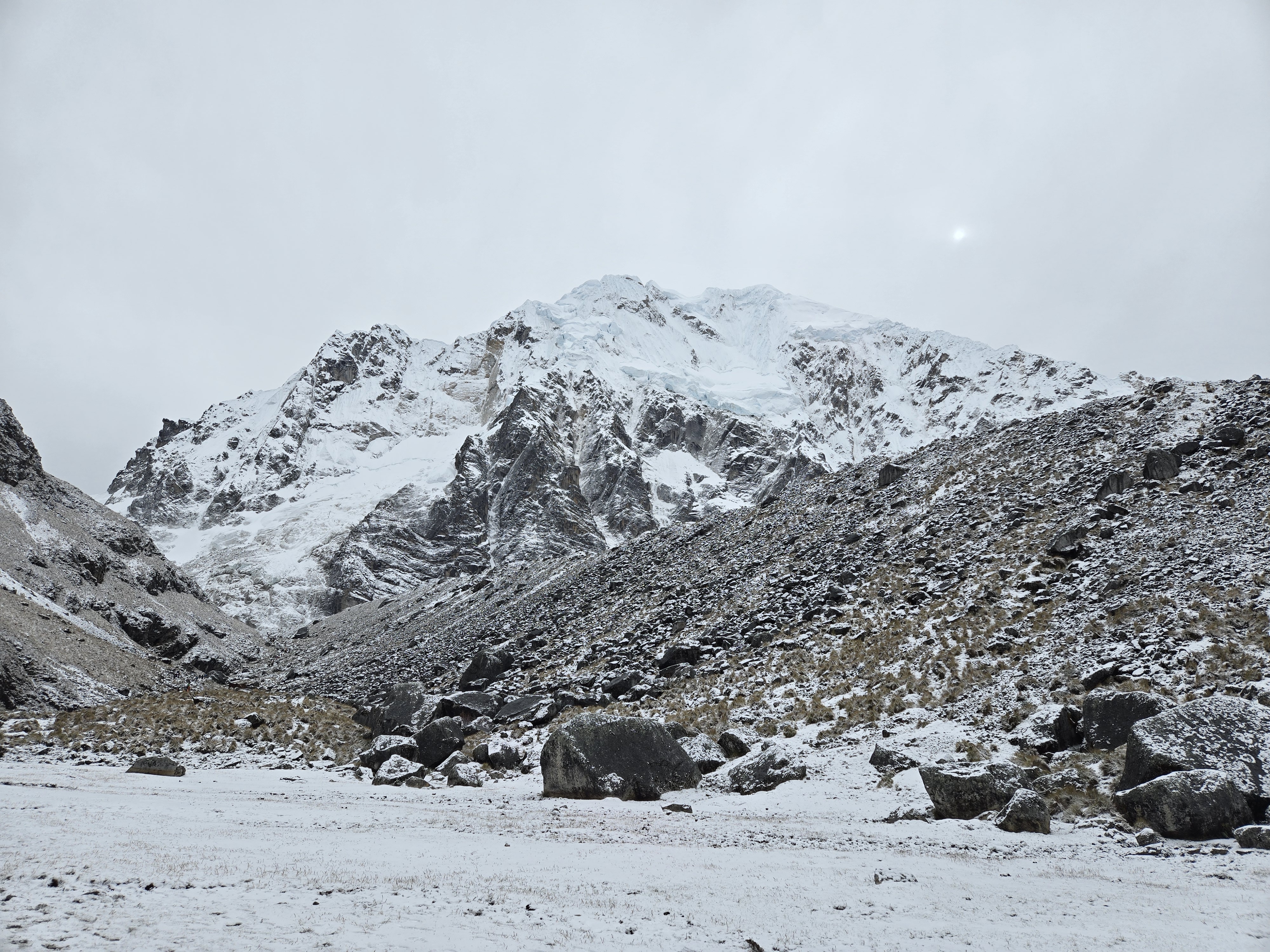 Snow-covered Salkantay Mountain beneath a blue sky